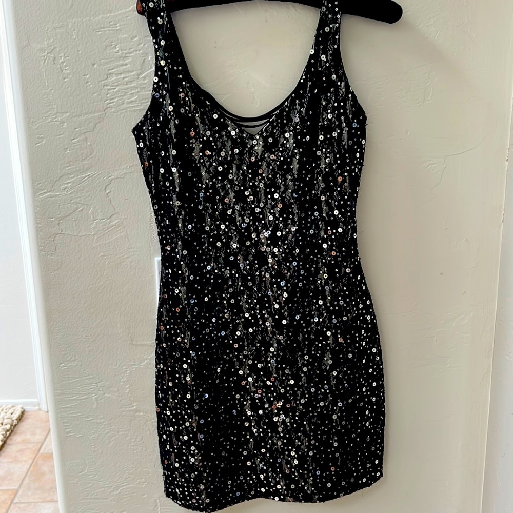 Going to Vegas?  Black cocktail dress size S with corset back and silver sequins